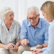 An Image of a Retired Couple Meeting with a Financial Advisor Put On By Secure Money Advisors In Pittsburgh