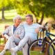 An Image of Retired Couple Sitting On a Bench Next To Bikes Put On By Secure Money Advisors In Pittsburgh