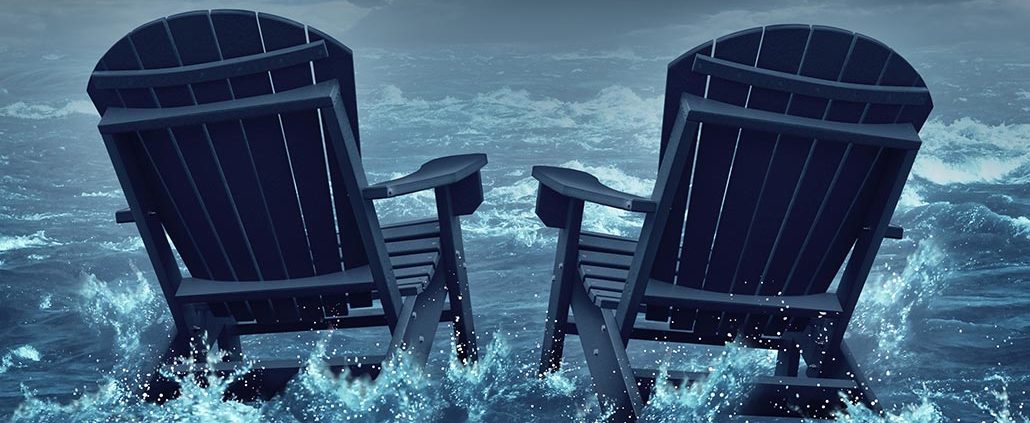 An Image of Two Lawn Chairs Floating in the Ocean Put On By Secure Money Advisors In Pittsburgh