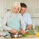 An Image Of A Retired Couple Cooking Together Put On By Secure Money Advisors In Pittsburgh