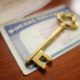 An Image Of A Golden Key Placed On Top Of A Social Security Card Put On By Secure Money Advisors In Pittsburgh