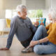 An Image Of A Couple Enjoying A Glass Of Wine On The Floor Of Their House And Enjoying Retirement Put On By Secure Money Advisors In Pittsburgh
