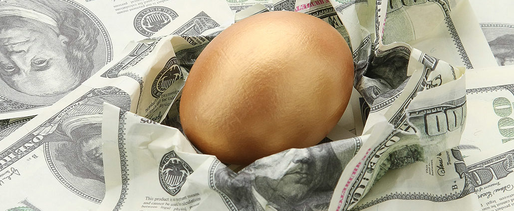 An Image Of An Egg On Hundred Dollar Bills For Retirement Planning That Boosts Your Nest Egg By $800K Put On By Secure Money Advisors In Pittsburgh