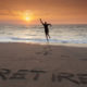 An Image Of A Person Running On The Beach At Sunset And Celebrating Retirement Put On By Secure Money Advisors In Pittsburgh
