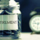 An Image Of Retirement Saving In A Jar With An Alarm Clock Put On By Secure Money Advisors In Pittsburgh