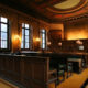 An Image Of A Man Sitting In A Court Room Put On By Secure Money Advisors In Pittsburgh