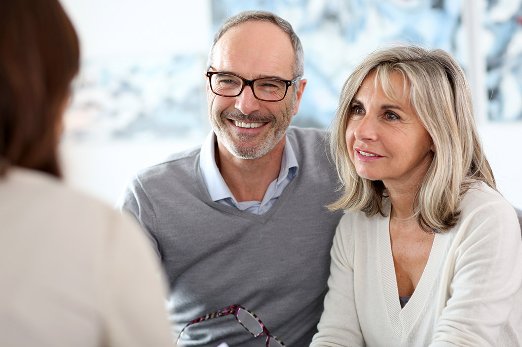An Image Of A Couple Discussing Retirement Planning With A Financial Advisor Put On By Secure Money Advisors In Pittsburgh
