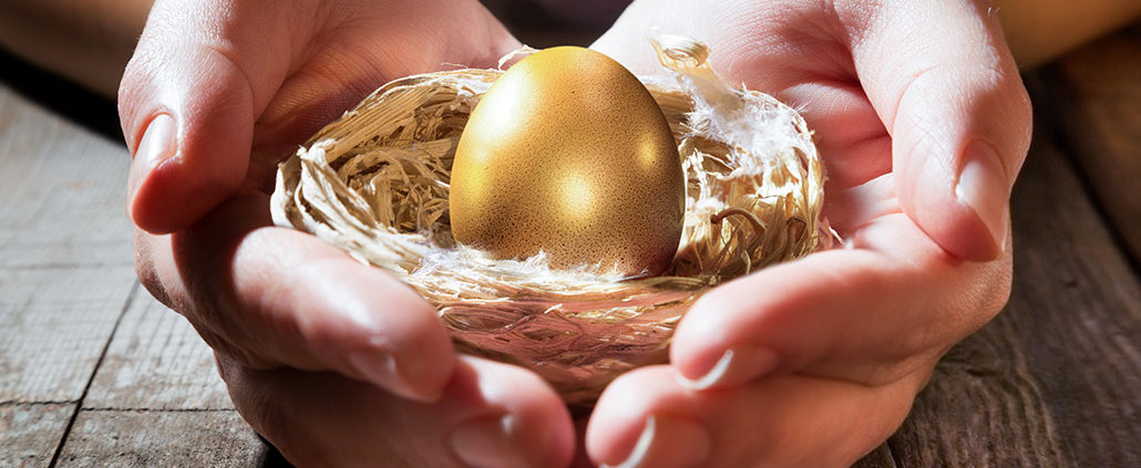 An Image of Hands Holding A Golden Egg In A Nest Put On By Secure Money Advisors For A Blog About How to Select the Right Annuity Plan for You
