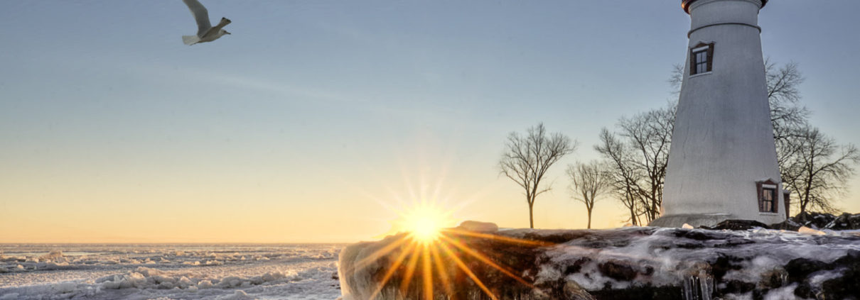 Winter time lighthouse on the lake